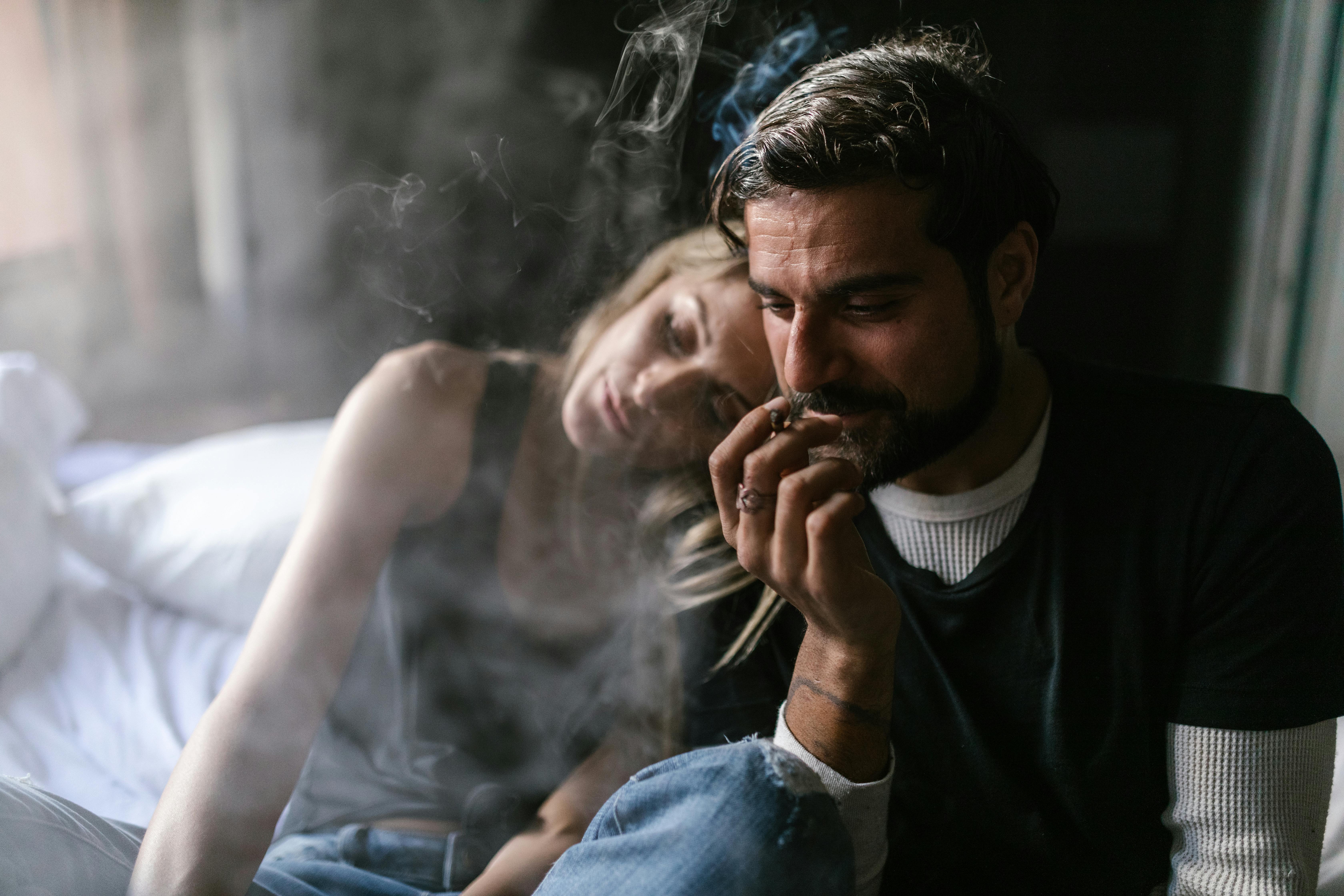 Man and woman enjoy the effects of nerolidol terpene in a joint