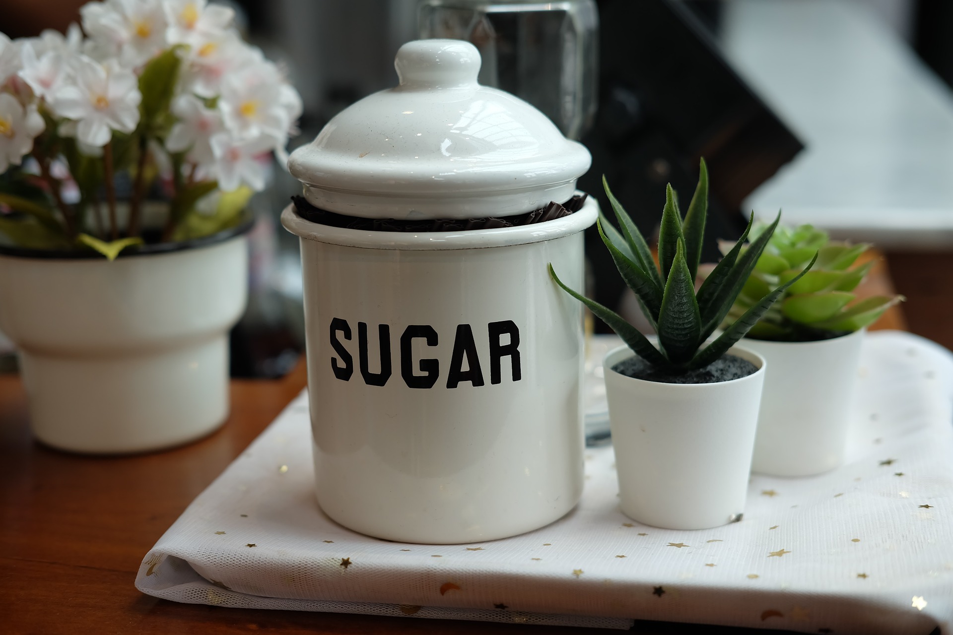 White sugar jar on kitchen table